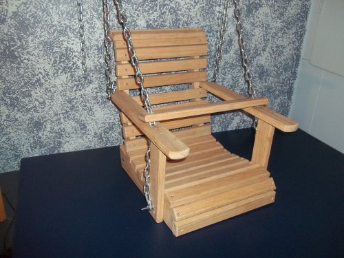 Handcrafted Solid Oak Child Porch Swing. These Wooden Child Porch Swings Will Bring Hours of Laughter to You and Your Child. Add This Wooden Childs Porch Swing to Your Backyard and Start Building Memories While Decorating Your Home Decor! Chain Is Included. Measures 13″ L X 14″ W X 19″ H. The Sitting Part of the Seat Is 14″ Across X 13″ Front to Back. This Swing Is Intended for a Toddler Size Child. Swing Is Unfinished so You Can Finish It to Match Your Decor. Can Easily Be Painted or Would Look Great Plain with Thompson’s Water Sealer Applied!