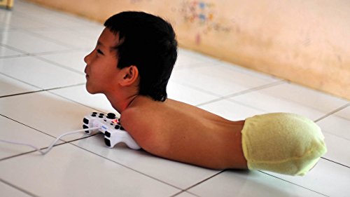 Limbless PlayStation Gamer Uses Chin And Shoulder To Play